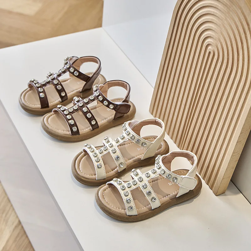 Kinderen Retro Romeinse Sandalen 2024 Gloednieuwe Koreaanse Comfortabele Zachte Zool Meisjes 'Mode Strass Strandschoenen Kinderen Zomer Flats