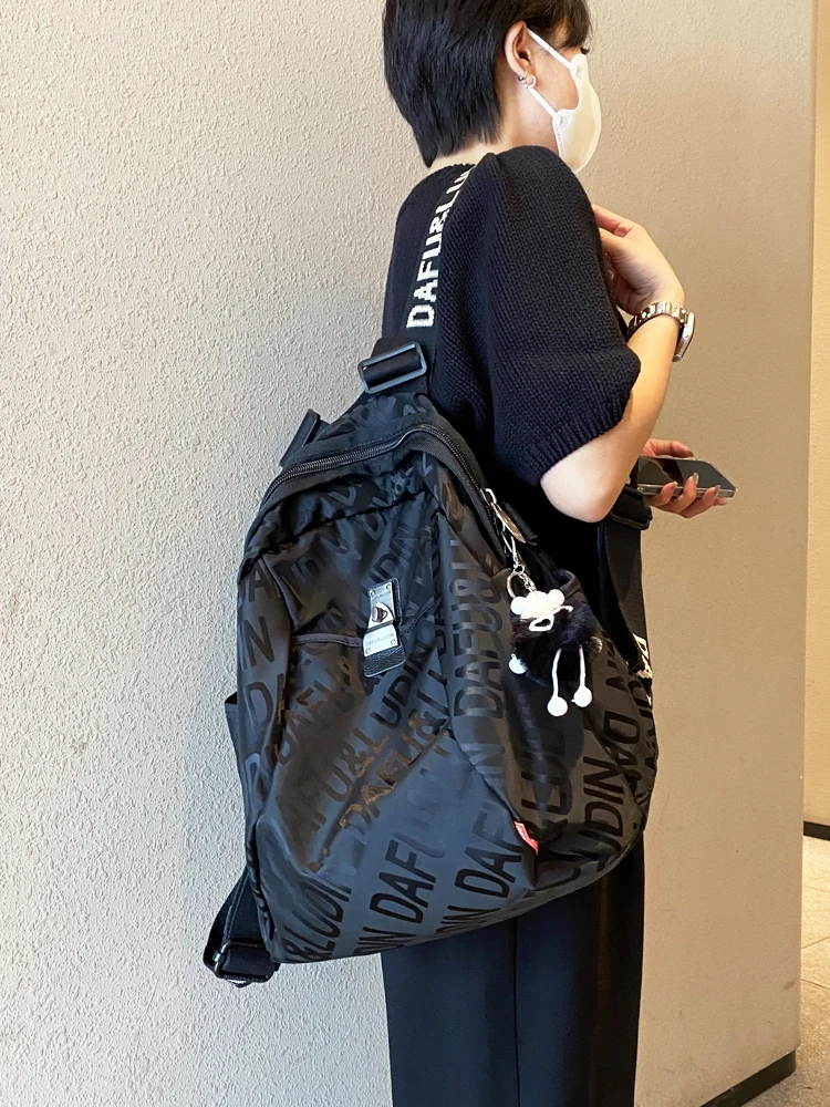 waterproof-oxford-cloth-backpack-double-shoulder-leisure-letter-print-large-capacity-thickened-traveling-business-trip-bag