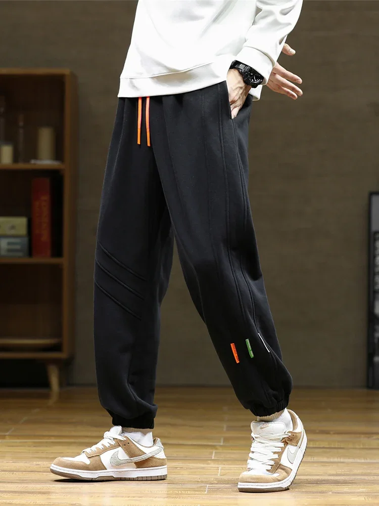 

Casual trousers men's large size loose autumn and winter padded and thickened sports trousers training jogging trousers