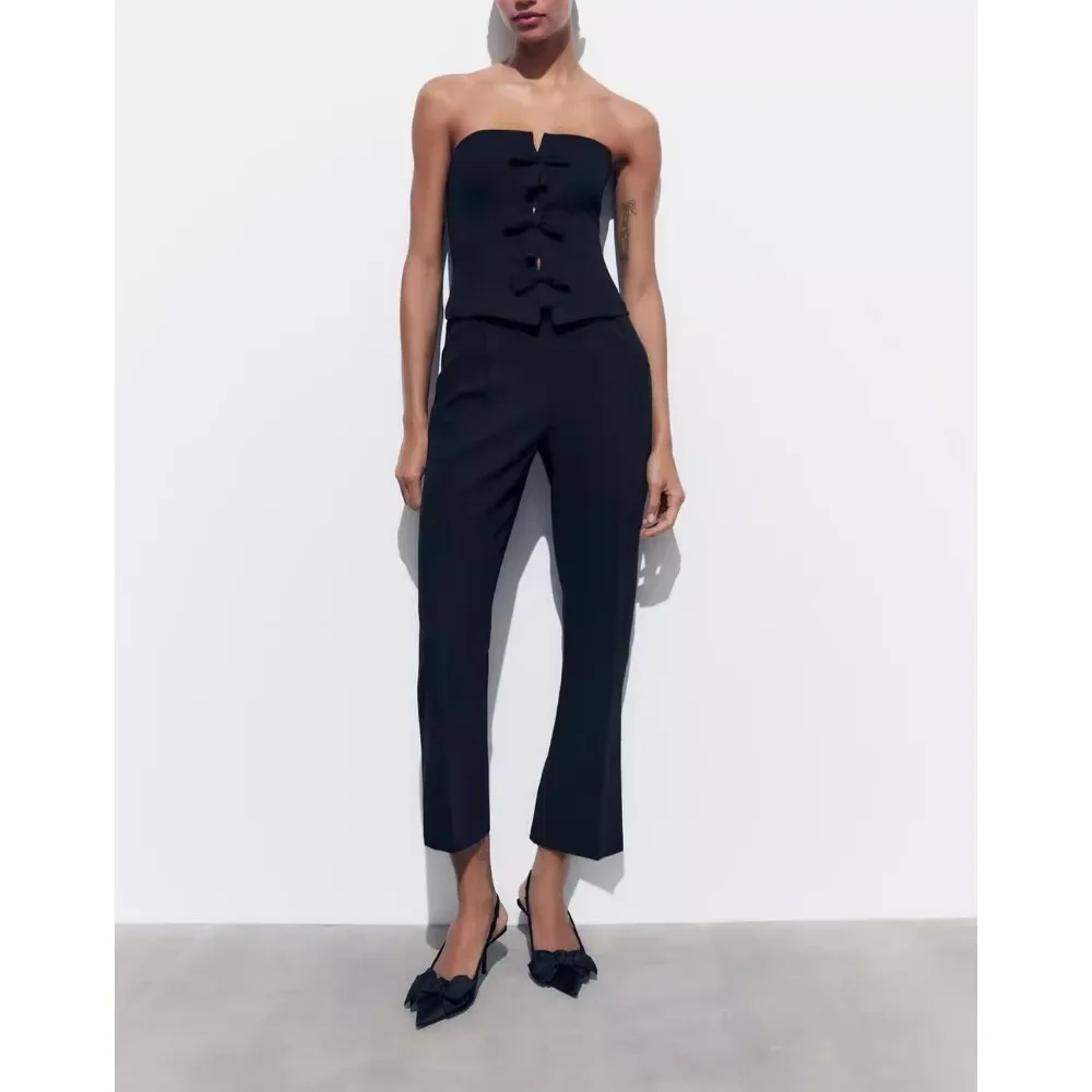 จั๊มสูทผู้หญิงแฟชั่นปี 2025 แขนกุด เปิดหลัง ซิปด้านข้าง แต่งโบว์ 3 มิติ โปร่ง จั๊มสูทขายาวทรงกระบอก สีดำ ผอมเพรียว