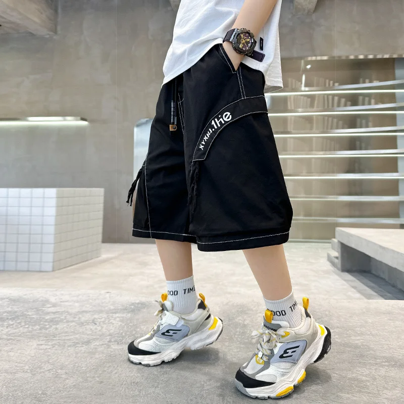 Pantaloncini cargo per bambini di nuova moda per ragazzi Pantaloncini estivi stile ampio Streetwear Bambino Adolescente Pantaloni al ginocchio in cotone casual 5-14 anni