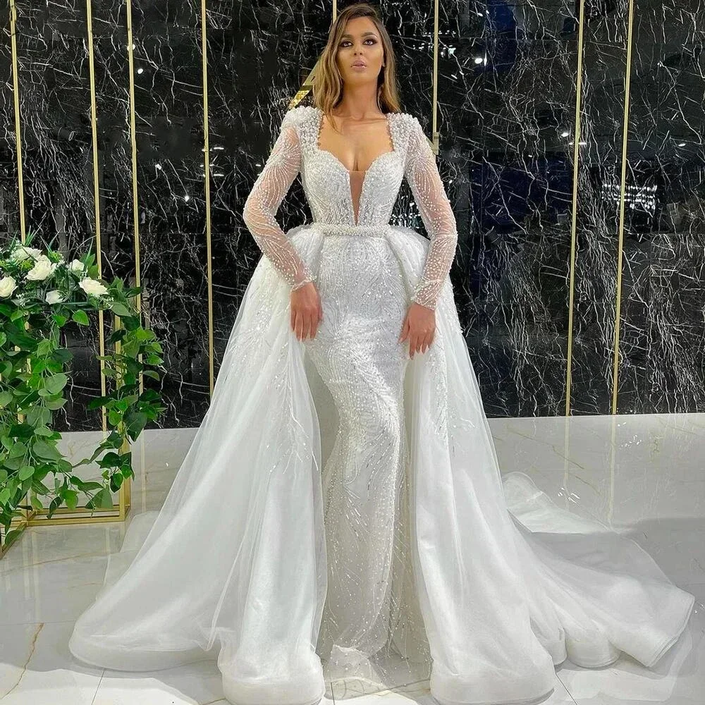 Abiti da sposa con paillettes di perle di lusso Abiti da sposa con scollo a V profondo con strascico staccabile Sirena Abiti da sposa personalizzati