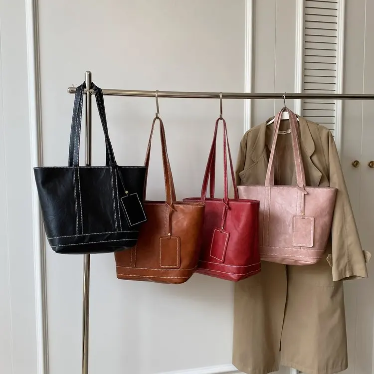 

New Soft Leather Women Tote Bag Large Capacity Commuter Vintage Handbags High-grade Sense Niche Shoulder Messenger Bags New