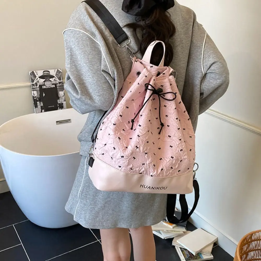Zaino plissettato con fiocco di grande capacità Borsa a tracolla dolce leggera in tinta unita Borsa fitness da donna con coulisse in stile coreano in nylon