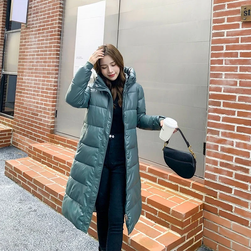 

Новое поступление 2025, женская длинная черная глянцевая хлопковая стеганая куртка выше колена, свободная теплая зимняя куртка в корейском стиле