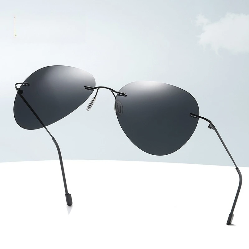 

2026 New Ultra-Lightweight Metal Polarized Rimless Sunglasses Classic Driving Shades UV400 Day-to-Night Photochromic Glasses