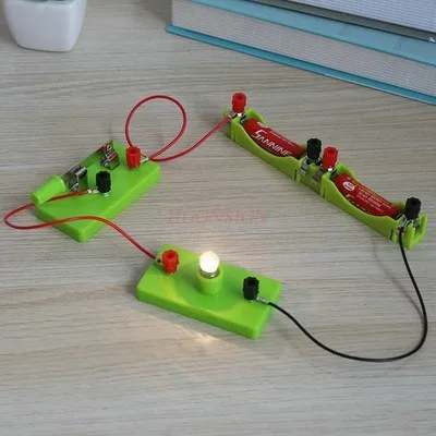 Students simple circuit science experiment light bulb lamp holder switch battery box wire fourth grade classroom