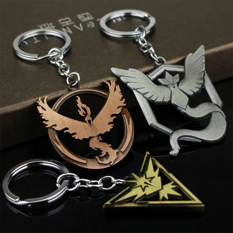 Pokemon Animation Game Articuno Zapdos Moltres Logo Plating Alloy Key Chain Bag Key Ring Pendant Accessories Birthday Gifts