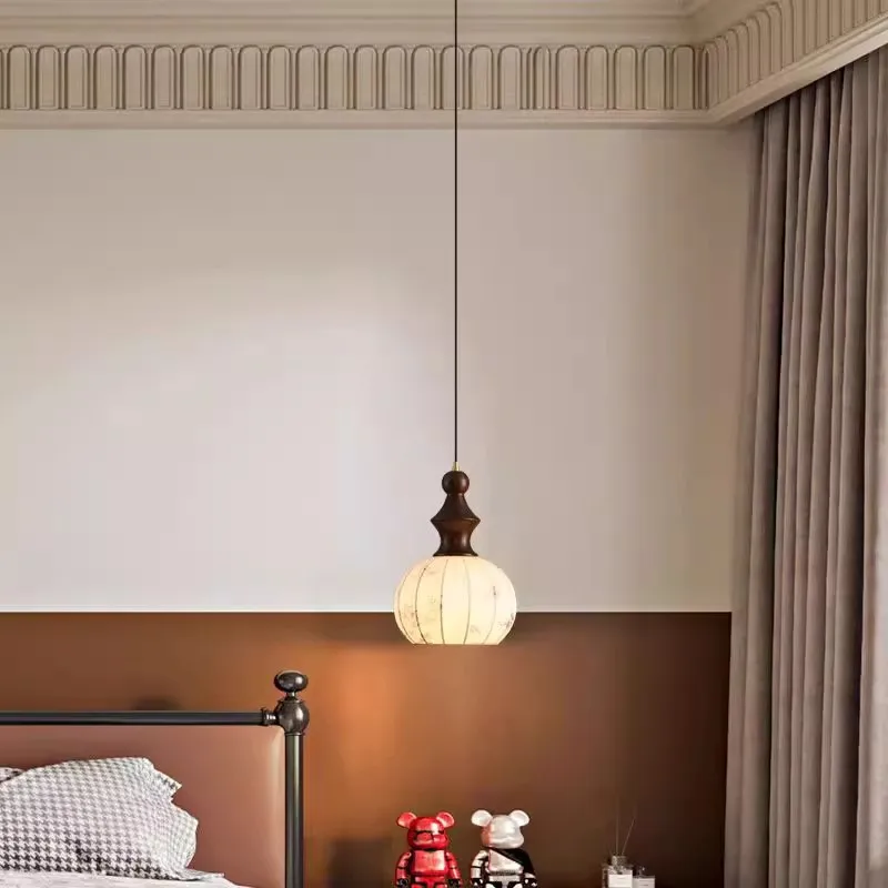 

Creative Japanese style pendant light made of retro yellow cave stone, light luxury style iron pendant light