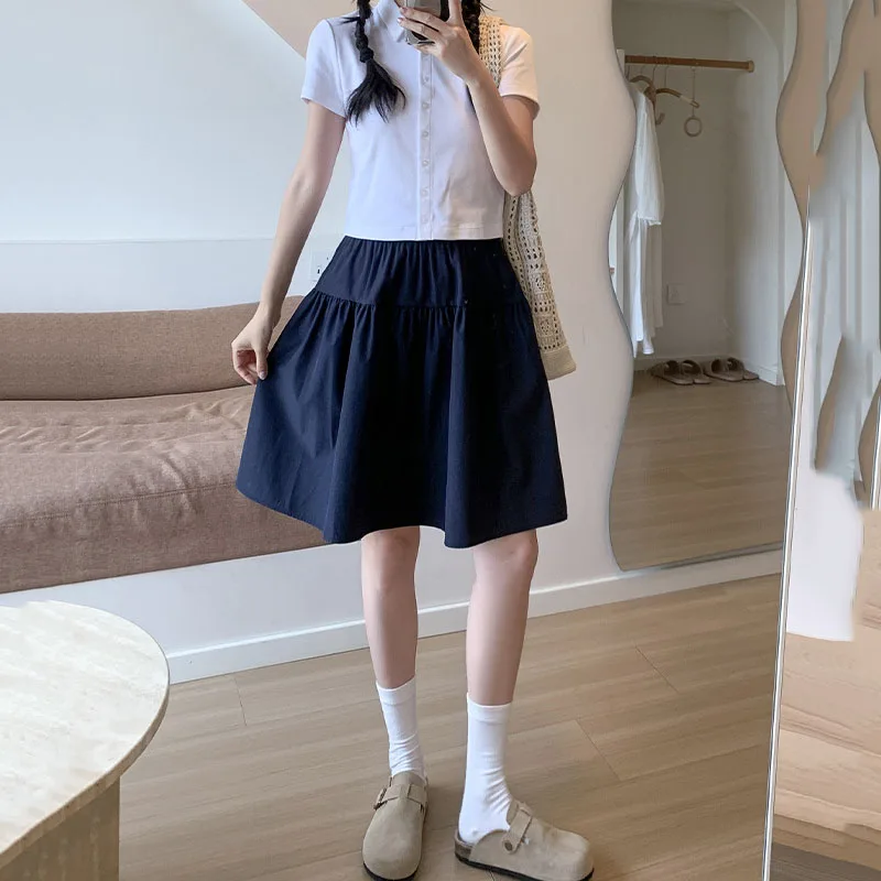 Falda corta holgada de estilo japonés para mujer, estilo universitario, cintura elástica con bolsillos, faldas para estudiantes, falda Lisa informal que combina con todo