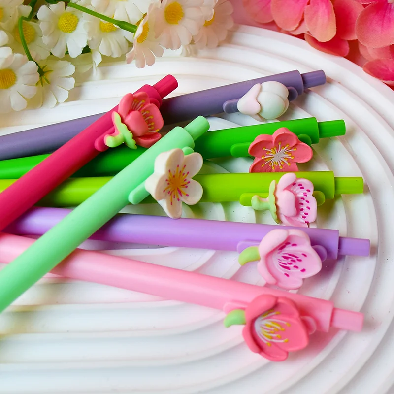 12pcs Ballpoint pen with asmall flower-shaped accessory a must-have for flower lovers a creative gift and a fun office essential