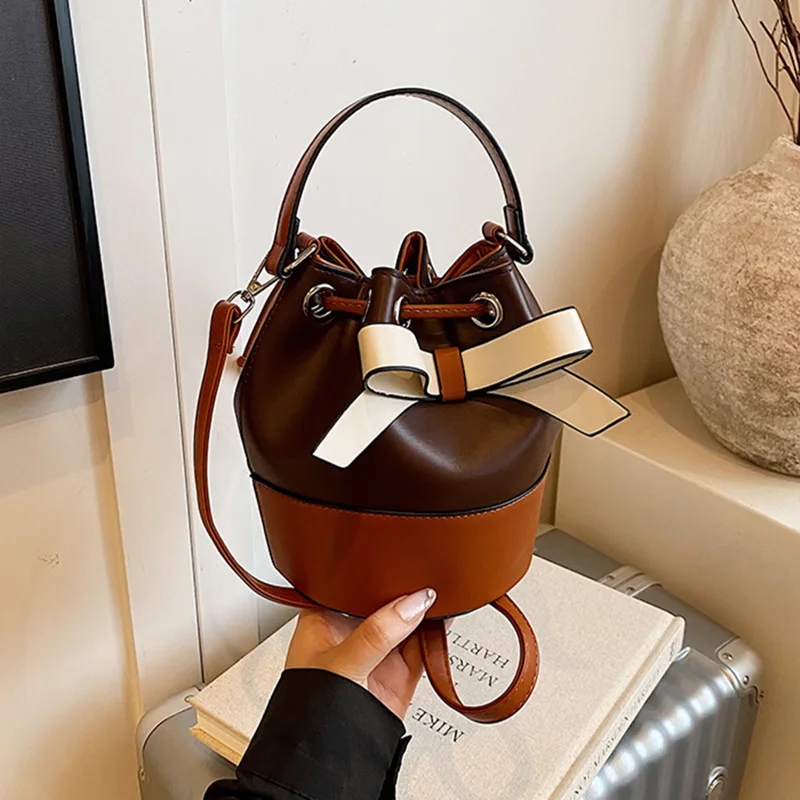 

Korean fashion bow contrasting color bucket bag for women 2025 new popular large capacity single shoulder crossbody bag