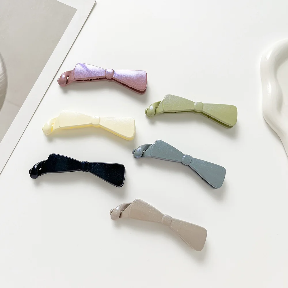 Simple arco plátano Clip grande Flash fino moda Cola de Caballo titular Color sólido nuevas pinzas para el cabello mujeres