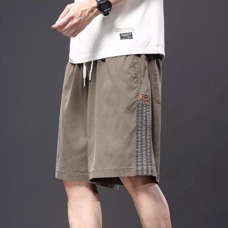 

Свободные мешковатые широкие шорты для мужчин Бегуны Спортивные мужские шорты на шнурке с карманами Эластичная дизайнерская одежда оптом