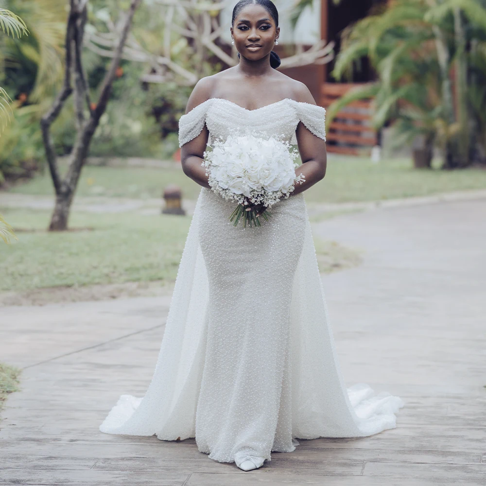 

Exquisite Mermaid Wedding Dresses with Detachable Train Off Shoulder Sleeveless Pearls African Lawn Bridal Gown Customized