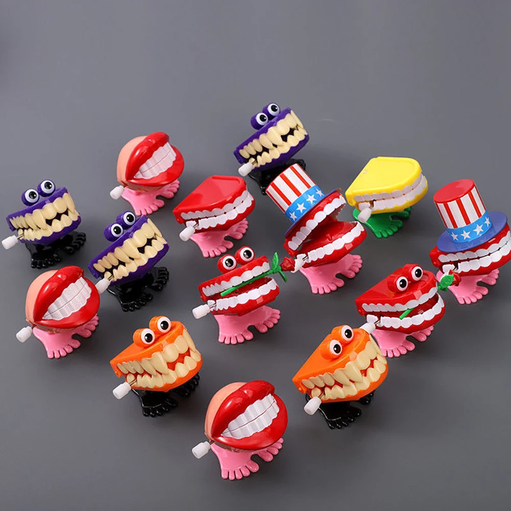 1pcs Tooth Shape Clockwork Toy Mini Funny Cute Walking Children Jump Teeth Running Clockwork Spring Wind Up Toy Kid Gift