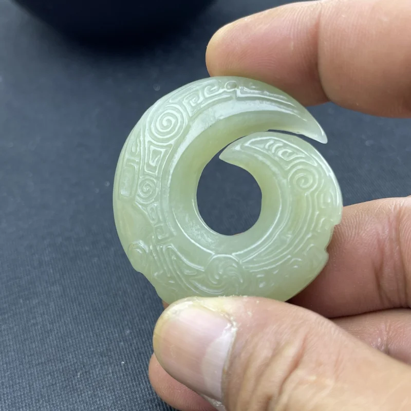 

Hetian jade pendant, unisex, with a rotating, featuring a reincarnation motif, a safe design, and an embossed