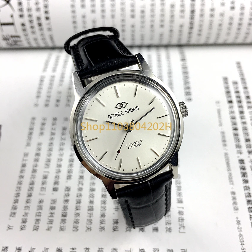 Original inventory from Beijing Watch Factory, all steel white faced manual mechanical watch with a diameter of 35mm