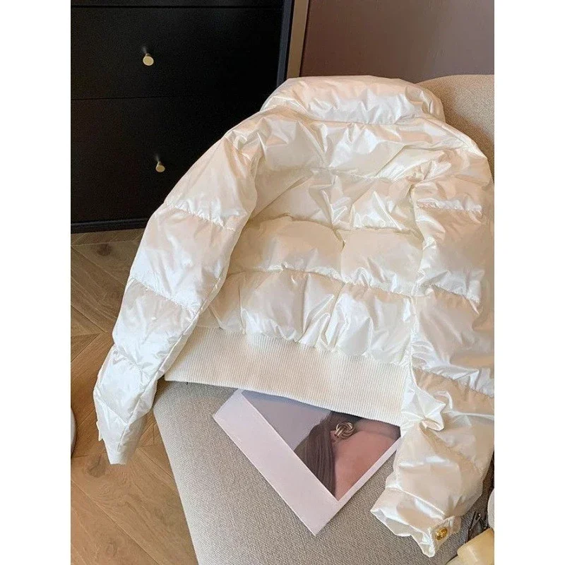 A white stand-up collar fashionable thickened cotton-padded jacket women winter design sense versatile warm padded bread jacket