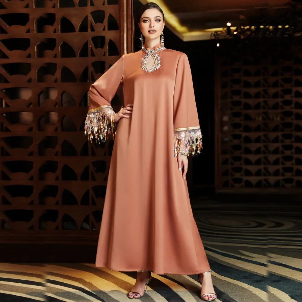 UNI Eid Muslim Woman Abaya Party Dress 2024 Hollow Out Collar Tassels Vestidos Long Sleeve Dubai Loose Abaya Ramadan Long Robe