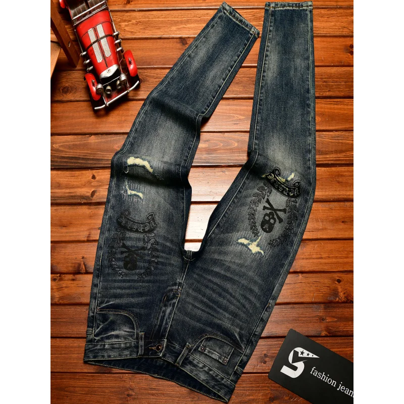 High end jeans men with ripped holes, street fashion prints,, small feet, elastic, retro and handsome pants