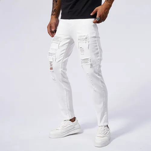 Imagen 2 del producto Pantalones vaqueros blancos de algodón para hombre, ajustados, elásticos, con agujeros rasgados, pantalones vaqueros coreanos a la moda, pantalones ajustados Rock, ropa informal estilo Hip-hop