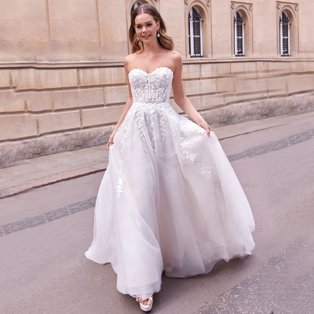 Customized Luxury Wedding Dresses 2026 Sweetheart Lace Appliques Tulle A Line Bridal Gown Corset Backless Bride Dresses