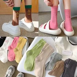 New candy colored solid pile socks with embroidered letters on the heel for sports socks