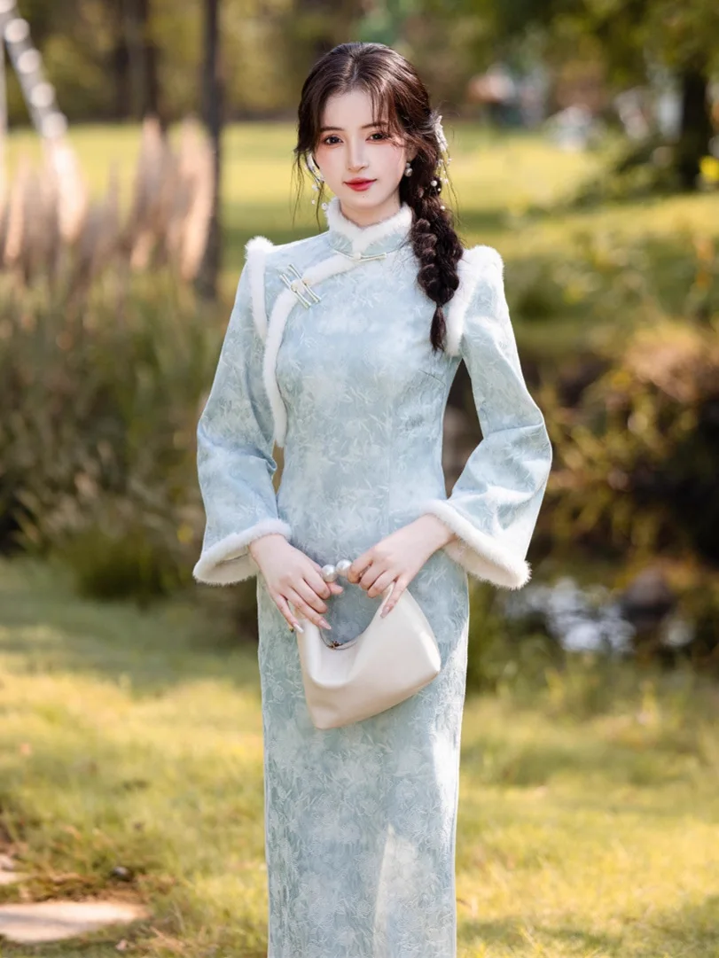 شيونغسام طويل سميك جديد لشتاء 2025 بأكمام كبيرة مقلوبة وياقة واقفة بقصة ضيقة من تشيباو