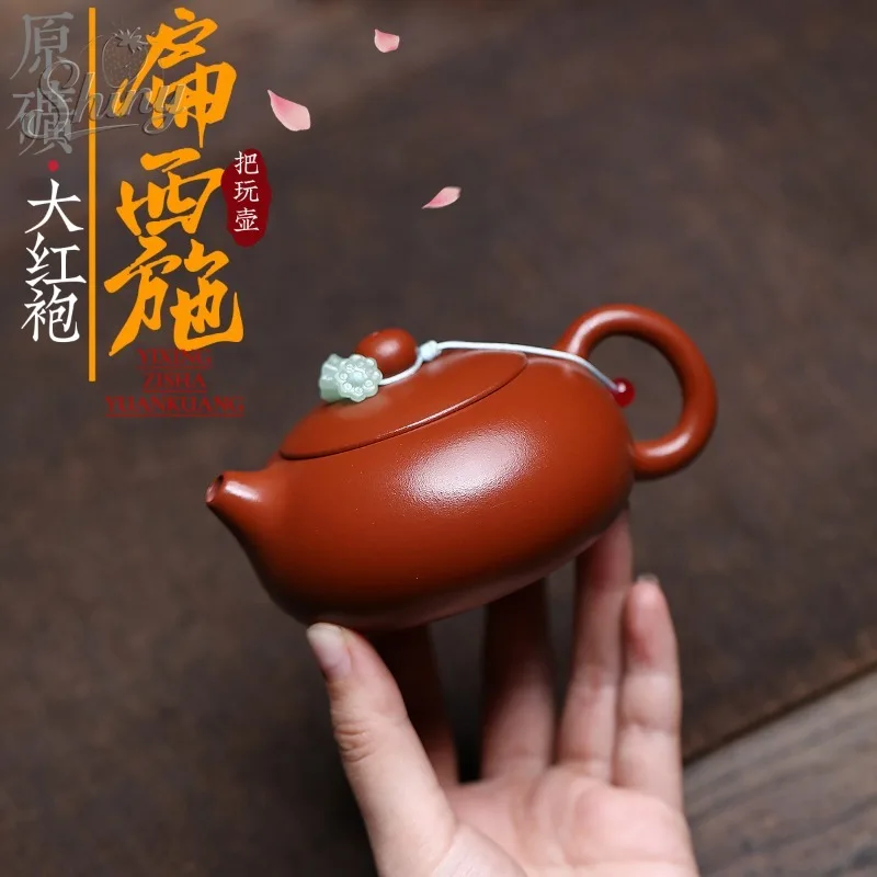 

Yixing Purple Clay Teapot Artisans Handcraft The Original Mineral Da Hong Pao Inwardly Pushed Ball-hole Flat Xi Shi Teapot