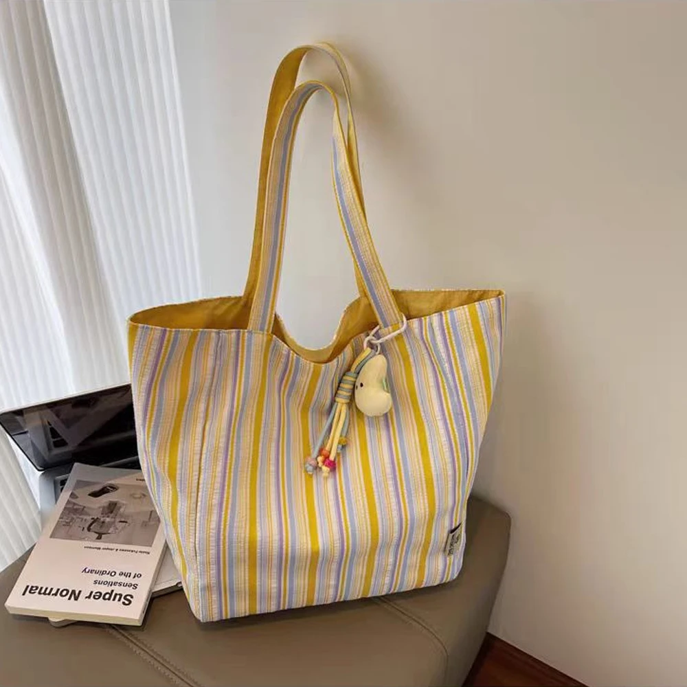 Modische und vielseitige Canvas-Tasche, frische und geräumige, gestreifte, lässige Umhängetasche für den täglichen Gebrauch. – Detail 6
