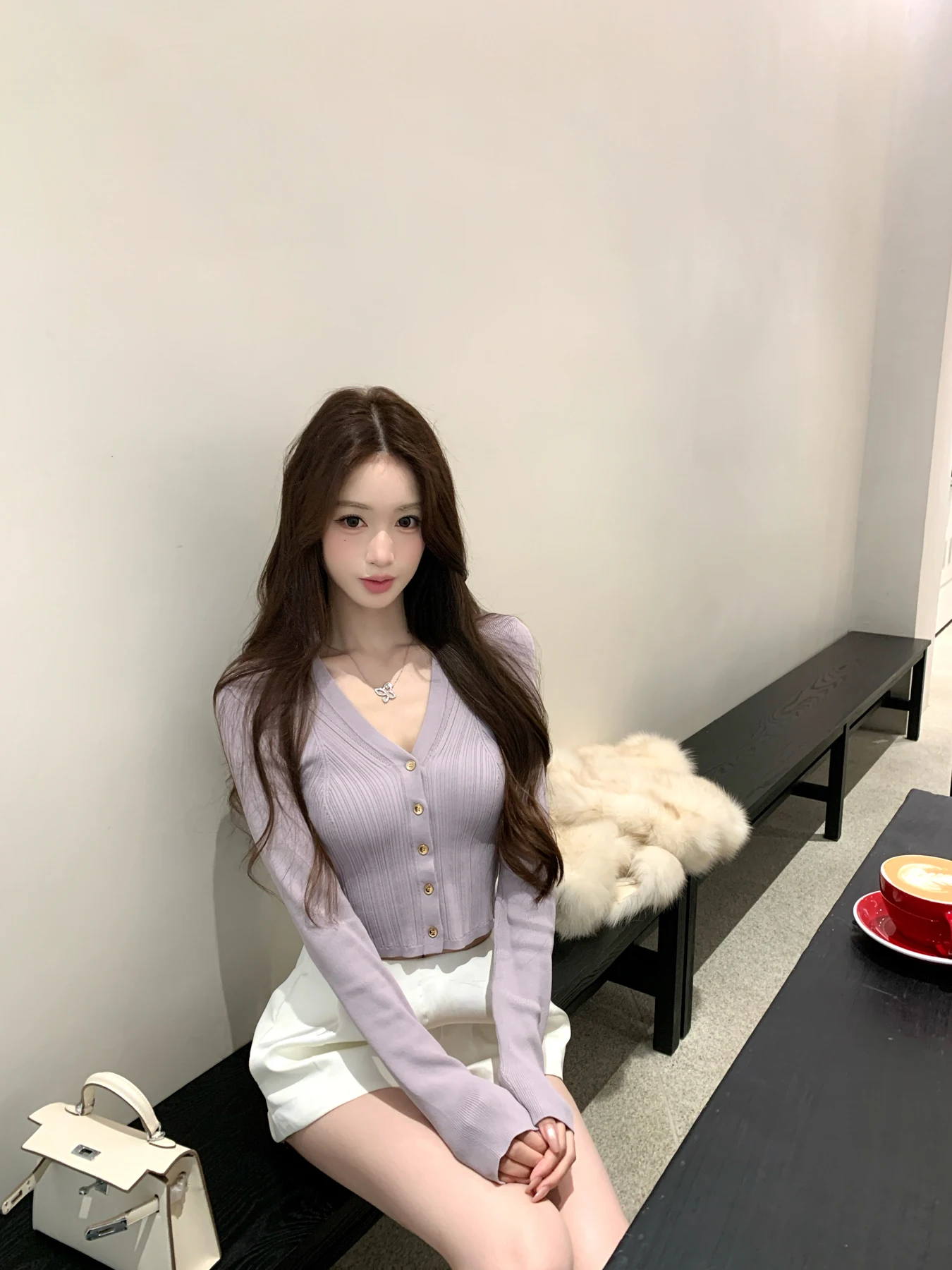 

JUNSTUDIO Knitted V-Ne ort Cardigan Women's Faion Spring 2026 Long Sve Two-Way Wear Slimming Top