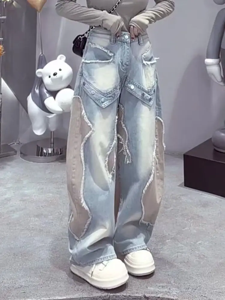 

American style street color collision splicing rivet burr design sense jeans women 2026 spring new high waist wide leg pants