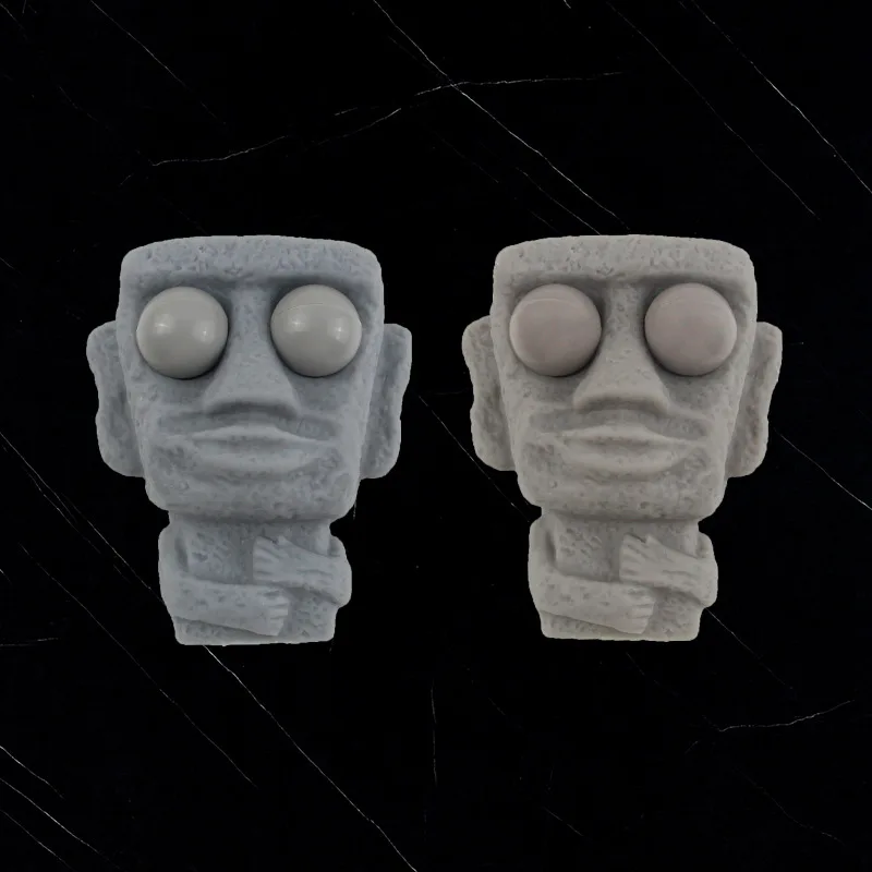 يطلق الرجل الحجري لعبة الضغط على انتعاش ببطء تمثال موي الناعم يضغط العينين التعبير المهتم يراخ الإجهاد هدية الأطفال