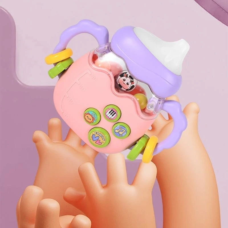 لعبة خشخيشة موسيقية لزجاجة الأطفال مع لعبة تعليمية لأجراس اليد الكهربائية ذات الموسيقى الخفيفة