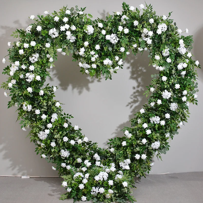 

Green plant rose heart shelf floral arrangement, wedding stage background decoration