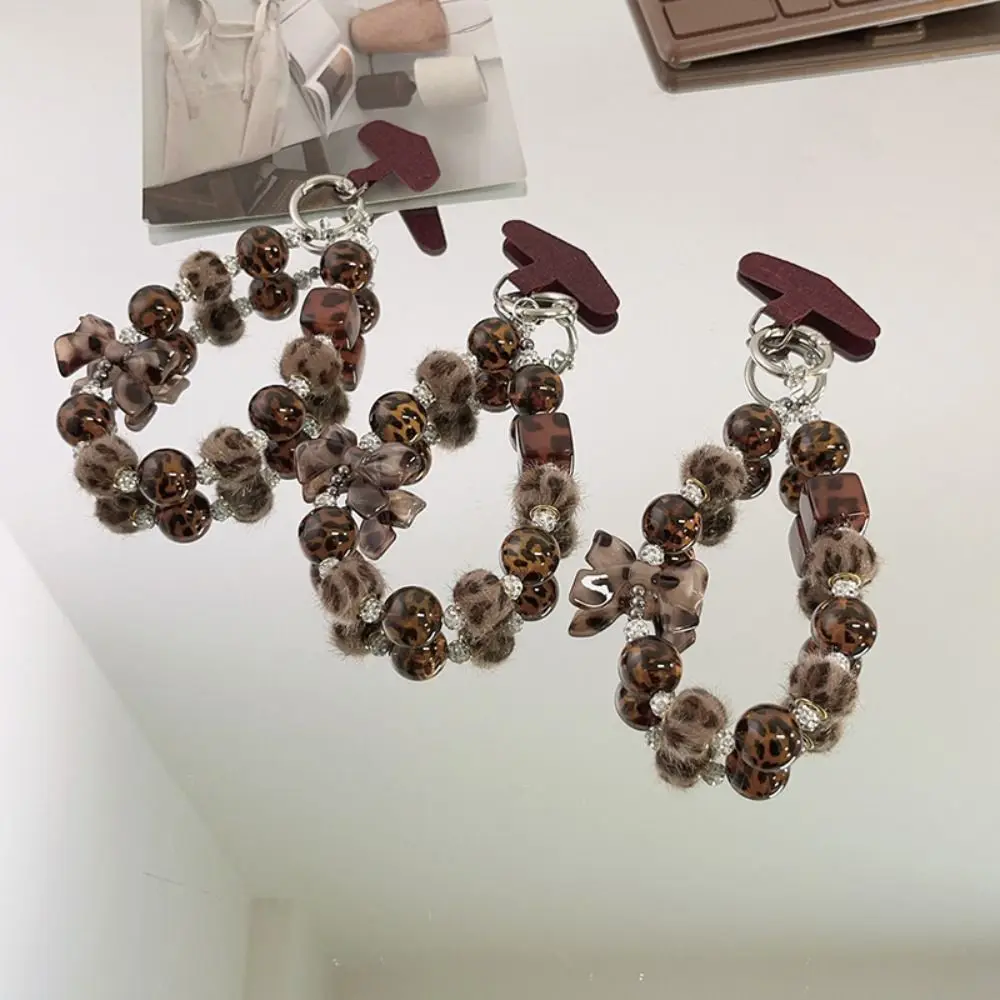 

Anti-Lost Leopard Print Phone Charm with Plush Ball Bow Beaded Mobile Phone Charm Chic Simple Mobile Phone Lanyard