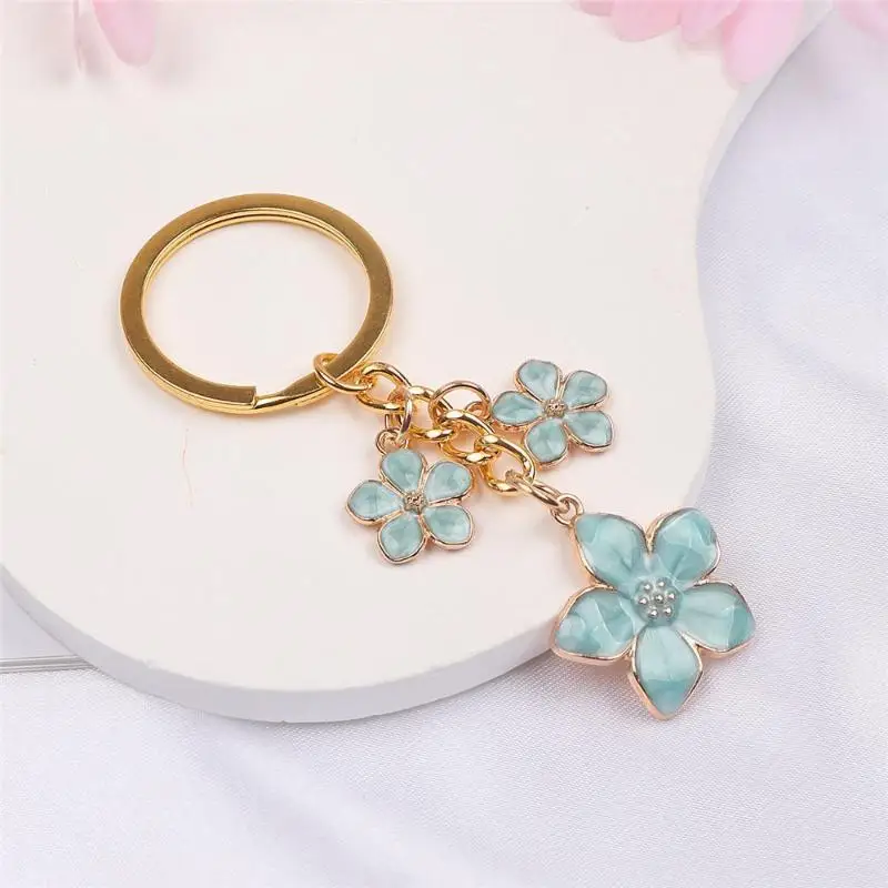 1 Stück Niedlicher Blumen-Schlüsselanhänger, Süßer Einfarbiger Drei-Kirschblüten-Anhänger, Schlüsselring für Damen-Handtaschen-Deko – Detail 10