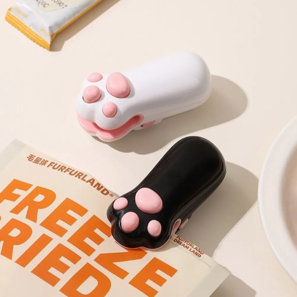 Image of Mini Katzenpfoten-Snackbeutel-Versiegler mit Typ-C-Ladefunktion, integriertem Cutter, magnetischer Rückseite und Heißsiegelung – Mini-Versiegelungsmaschine