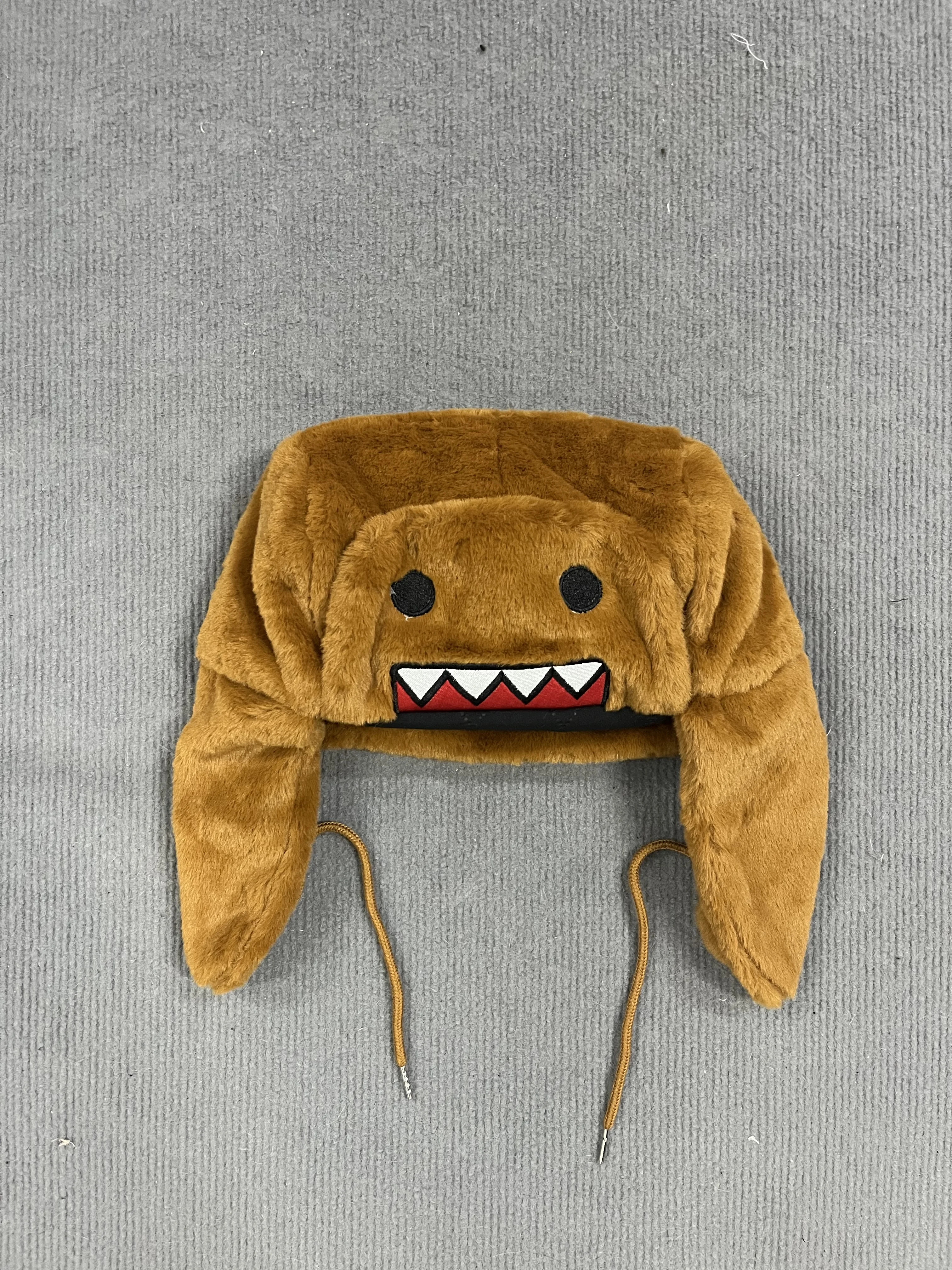 New Cute and Fun Domo‑Kun Cartoon Plush Winter Ear Protection Hat Brown Monster Warm Strap Hat Gift Street Trendy Accessories