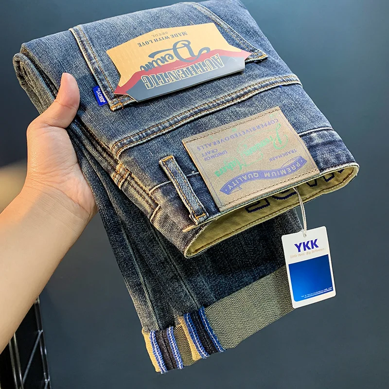 Celana panjang regang kasual ramping pria, jeans mewah kelas atas musim gugur n2024baru bordir tren slim fit