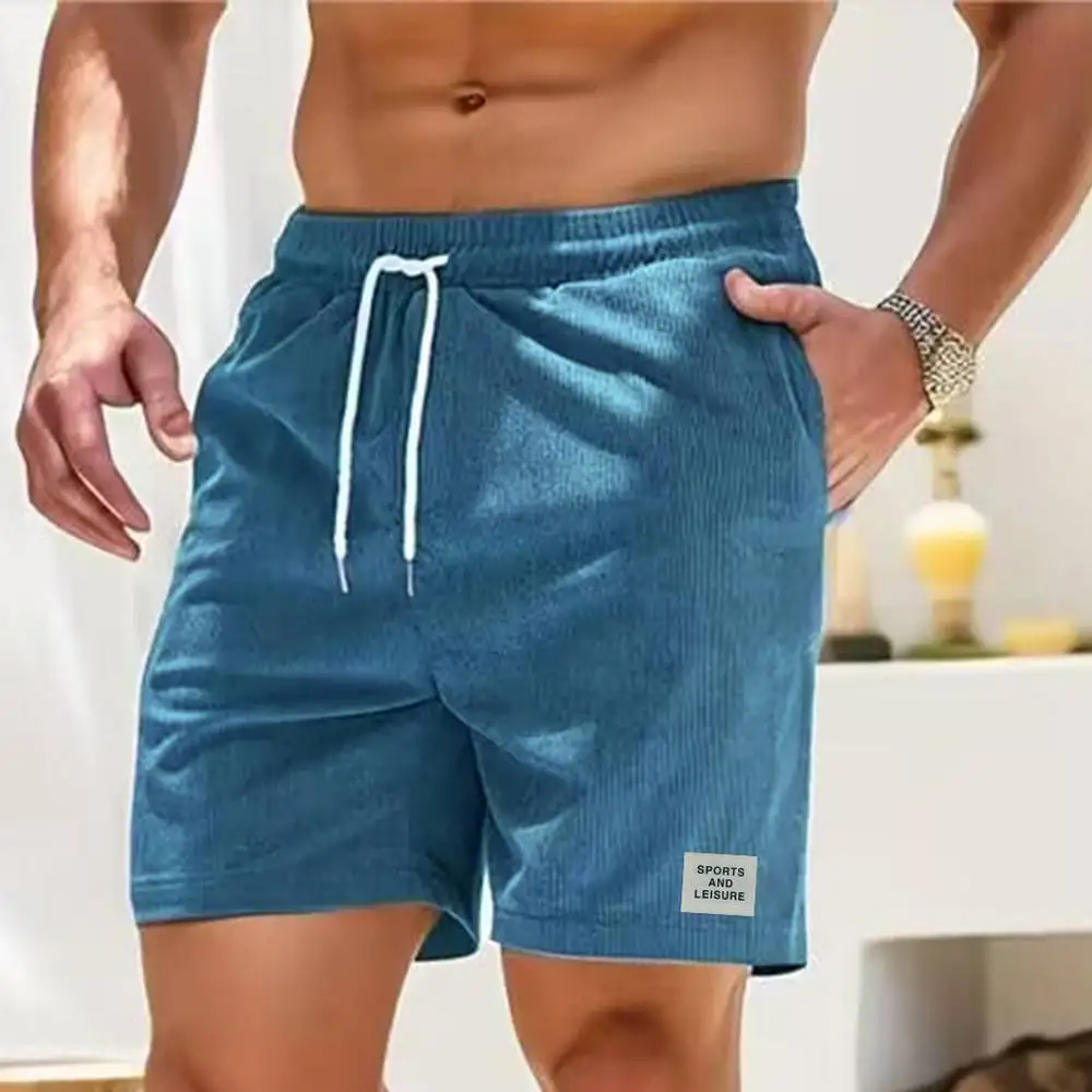 Pantaloni della tuta estivi nuovi pantaloni corti in velluto a coste con lacci pantaloncini da uomo semplici pantaloni a righe atletiche Casual