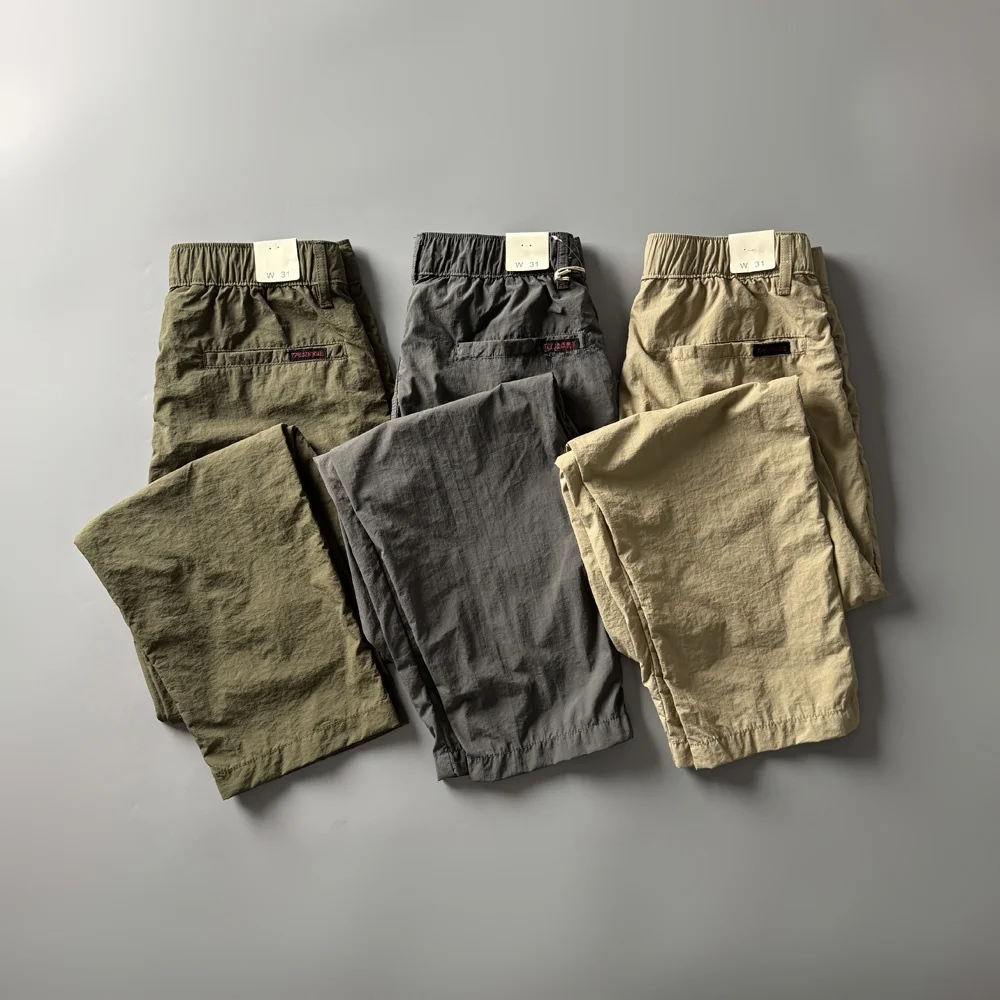 

Легкие дышащие повседневные брюки прямого кроя для лета, с карманами на молнии, эластичным поясом и зауженным силуэтом