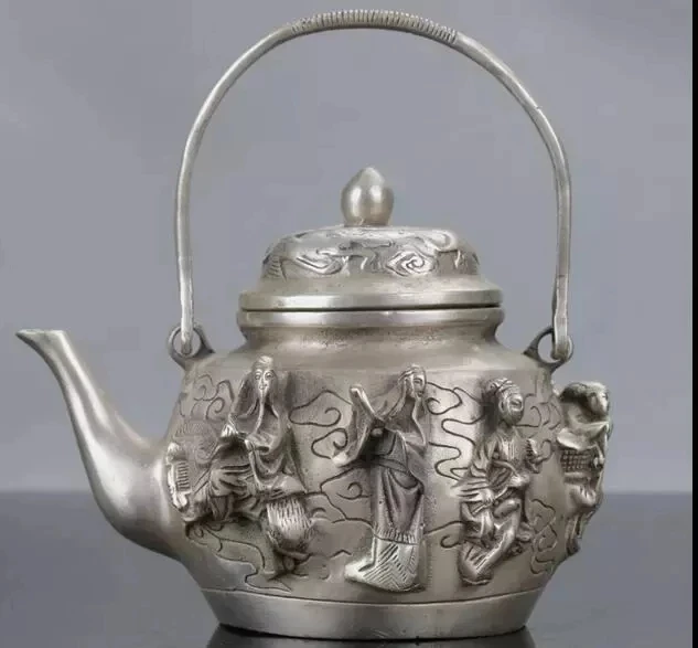 

Chinese Silver Copper Handwork Carved The Eight Immortals Teapot