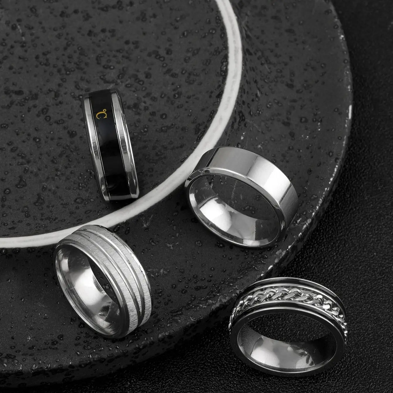 4PCS set of fashionable silver-tone stainless steel rings, a popular choice for men and women