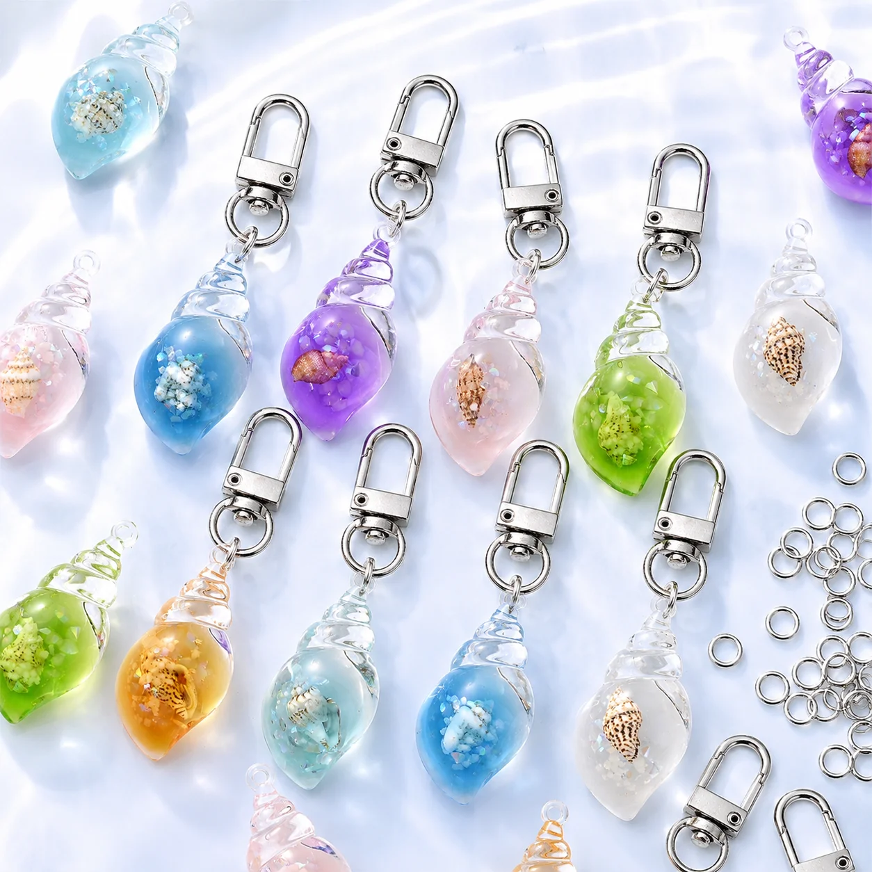 10er-Set mit zufälligen Farben, Ozean-Thema, Harz-Muschel-Schlüsselanhänger, leuchtender Muschel-Schlüsselring-Anhänger für Rucksack, Geldbörse, Autoschlüssel – Detail 3