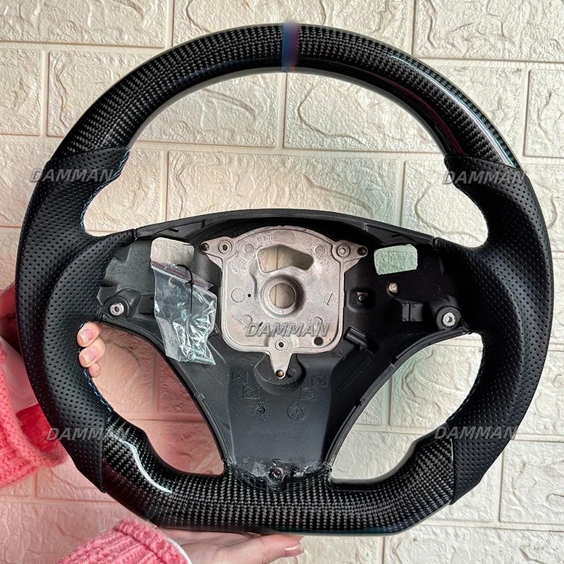 

Руль из углеродного волокна для BMW E90 E92 E93 E87 E91 E70 E71 E72 E89 E84 E81 E82 E53 2005 2006 2007 2008 2009 2010 2011 2012