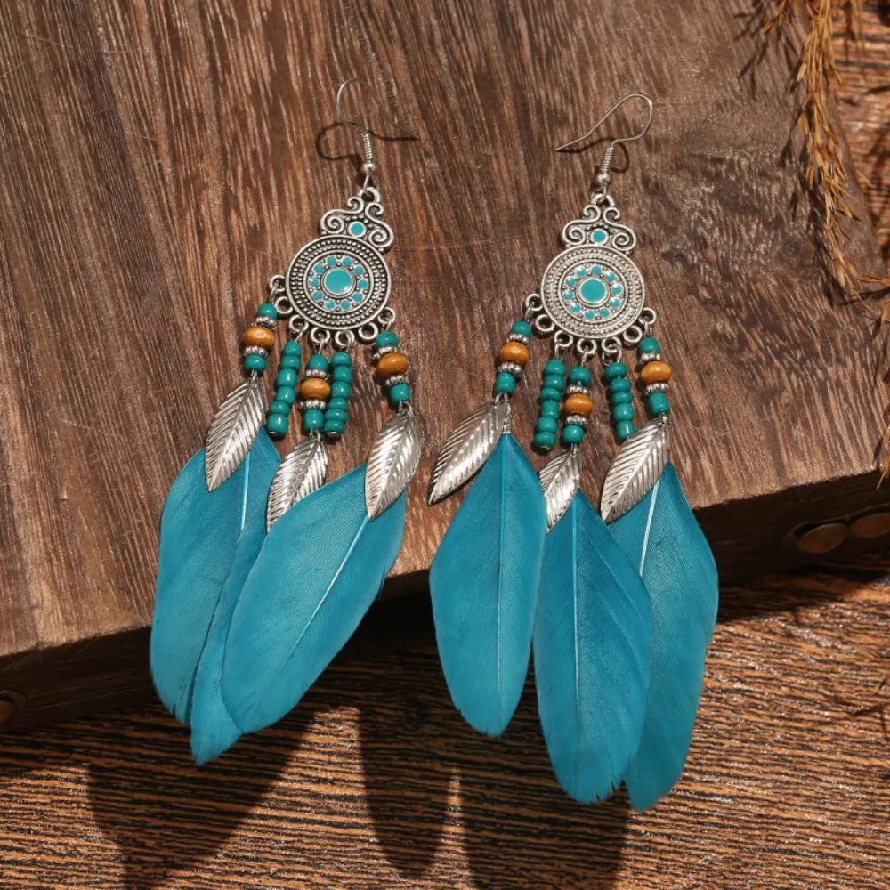 

Bohemian Feather Earrings Vintage Silver Filigree Long Dangle Drop Earrings Ethnic Jewelry for Women Perfect for Festival Gifts