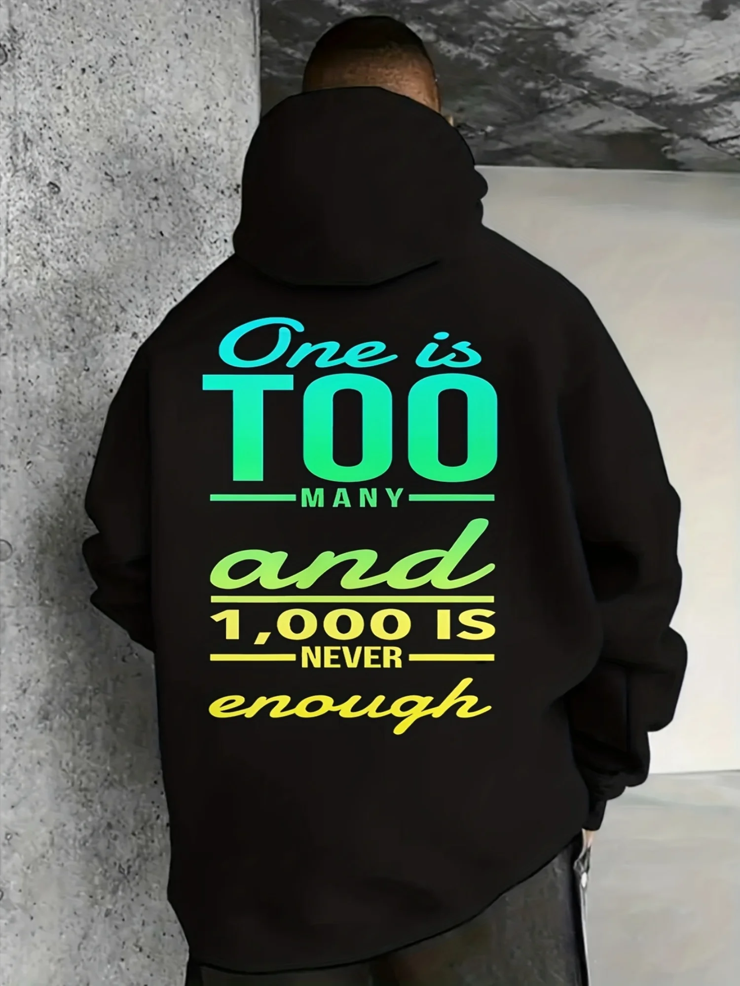 A classic black hooded sweatshirt featuring a kangaroo pocket, perfect for gaming days and casual wear for both men and women. This urban fashion staple combines an edgy aesthetic with a comfortable fit.