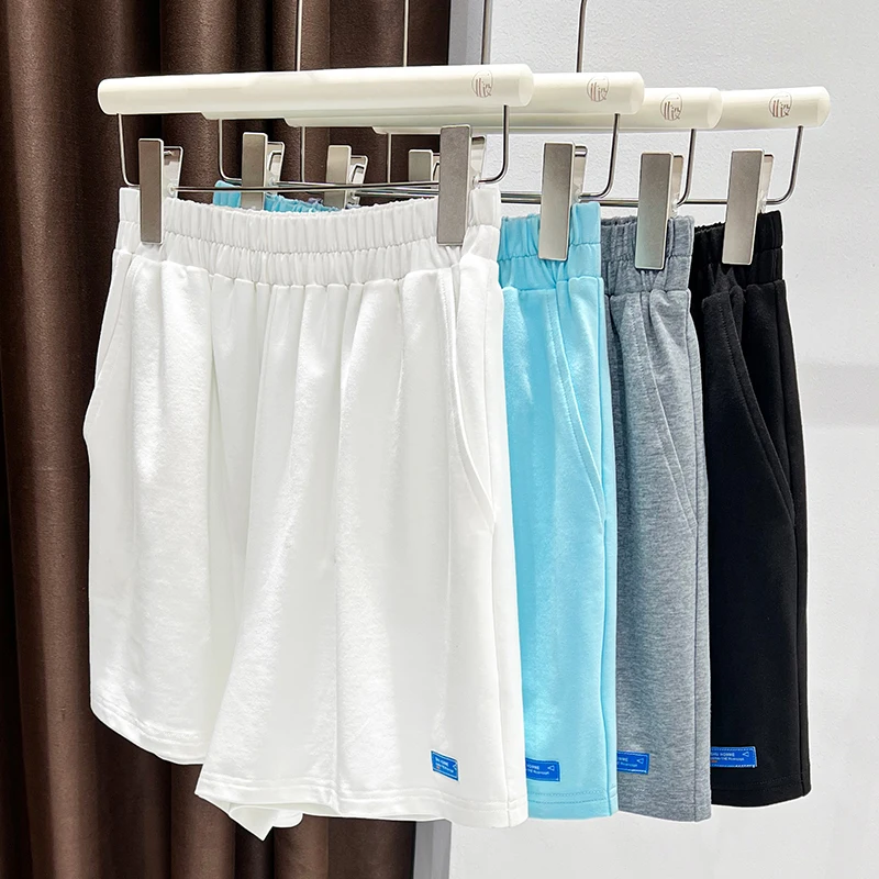 تي شيرت نسائي بكتف واحد على الطراز الفرنسي بأكمام قصيرة صيفي متوسط الأكمام محبوك من الأسفل نصف كم أحمر بكتف واحد عالي